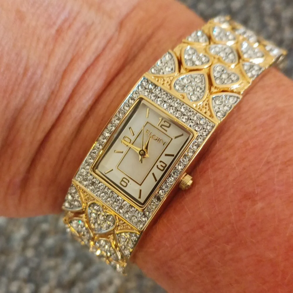 Elgin women gold tone and crystal watch with 2 gold tone bracelets